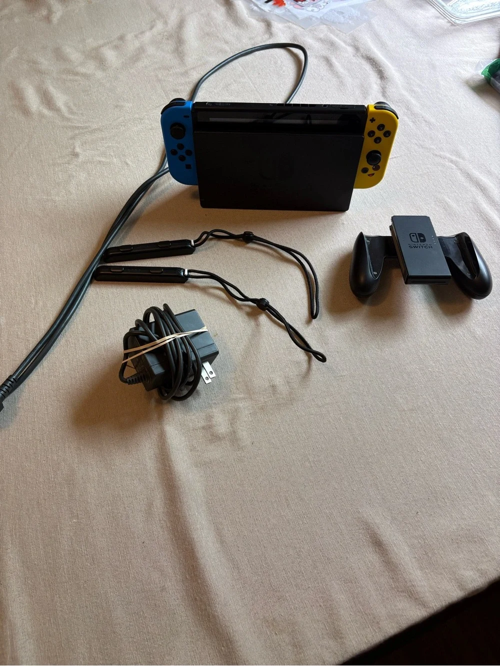 Nintendo Switch with Blue Left and Yellow Right Joy‑Con Controllers